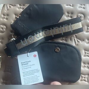 lululemon athletica Black and Gold Dual Pouch Wristlet